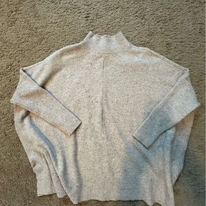 Mock turtleneck swing style sweater. Size XS. Only worn once. Very soft!